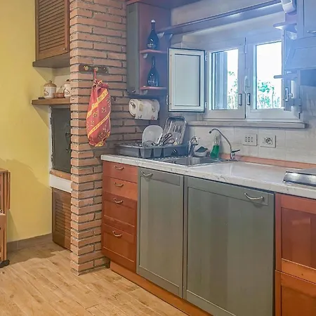 Holiday home Lovely In With Kitchen